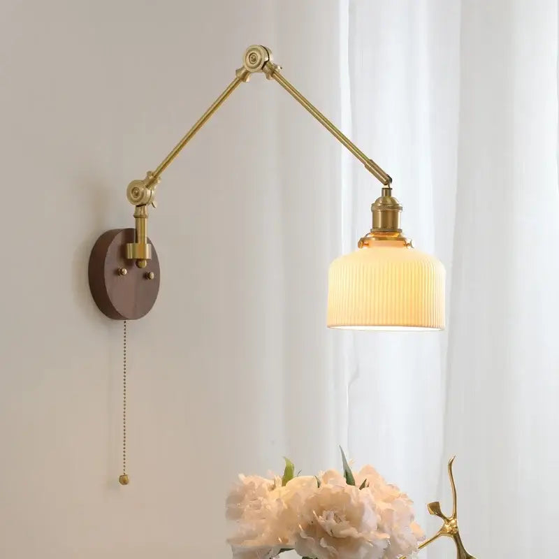 Brass adjustable wall light with ribbed cream glass shade and walnut wooden backplate decorbites led wall light