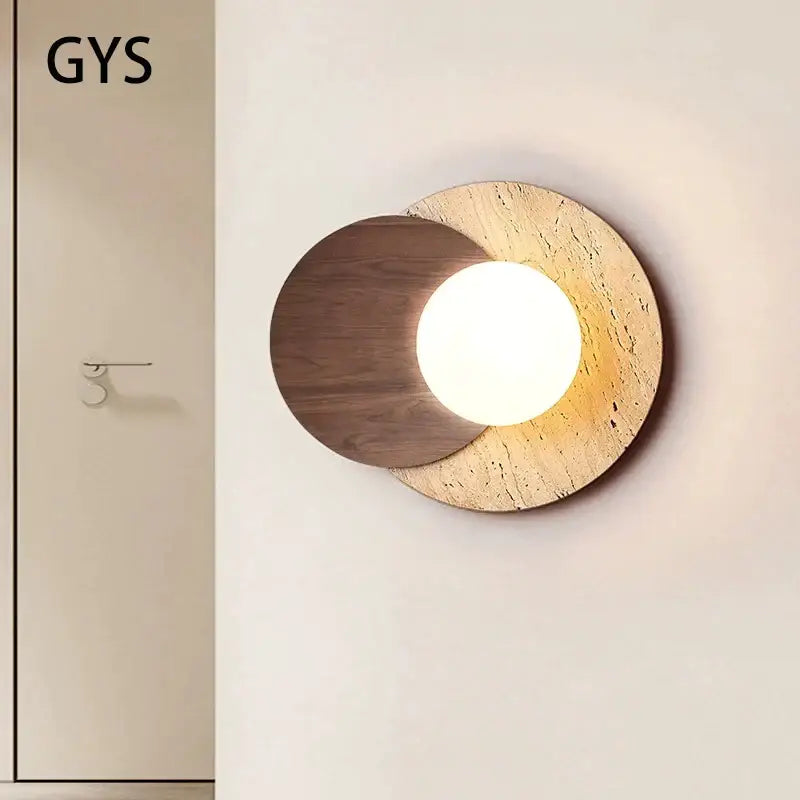 Modern walnut and cork led wall lamp by gys featuring overlapping wooden discs with warm glow for bedroom use
