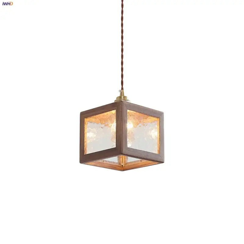 Modern walnut wood and clear glass pendant light with rustic brown wooden cube and brass-finished top for dining room