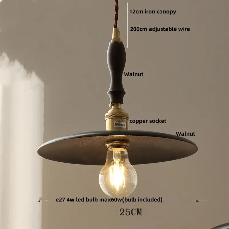 Modern walnut wood pendant light with a dark walnut handle, brass copper socket, and flat black metal disc shade