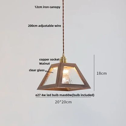 Modern walnut wood and clear glass cube pendant light featuring textured glass panels and brass copper socket for dining room