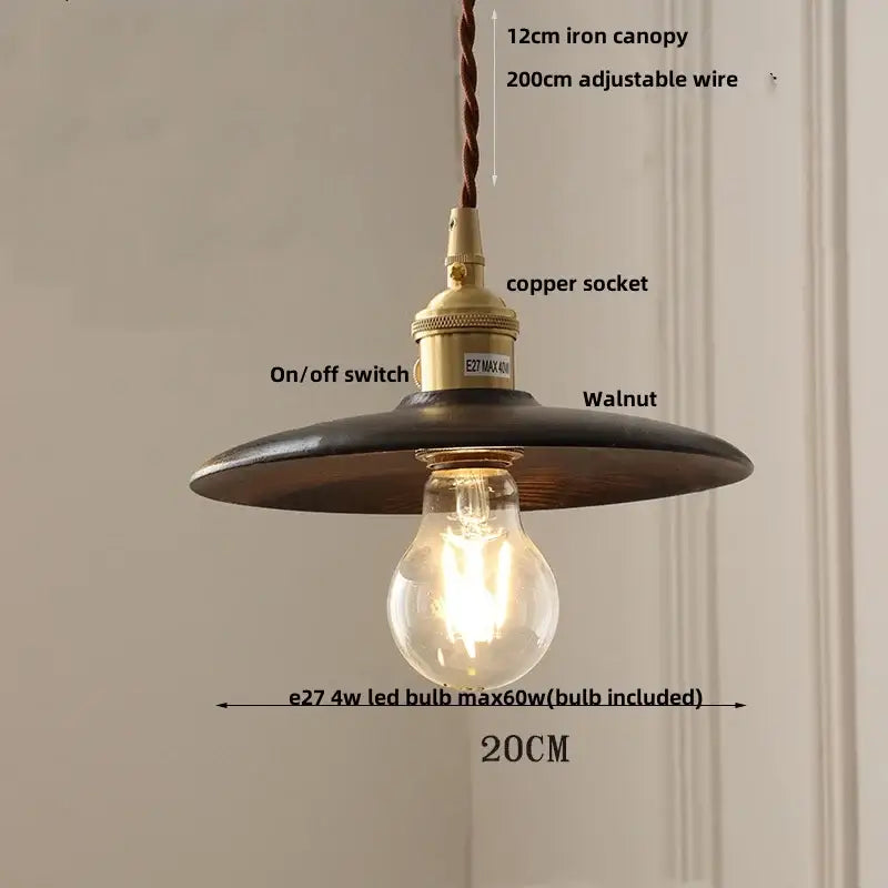 Modern walnut wood and clear glass cube pendant light with industrial dark iron canopy and brass socket for dining room