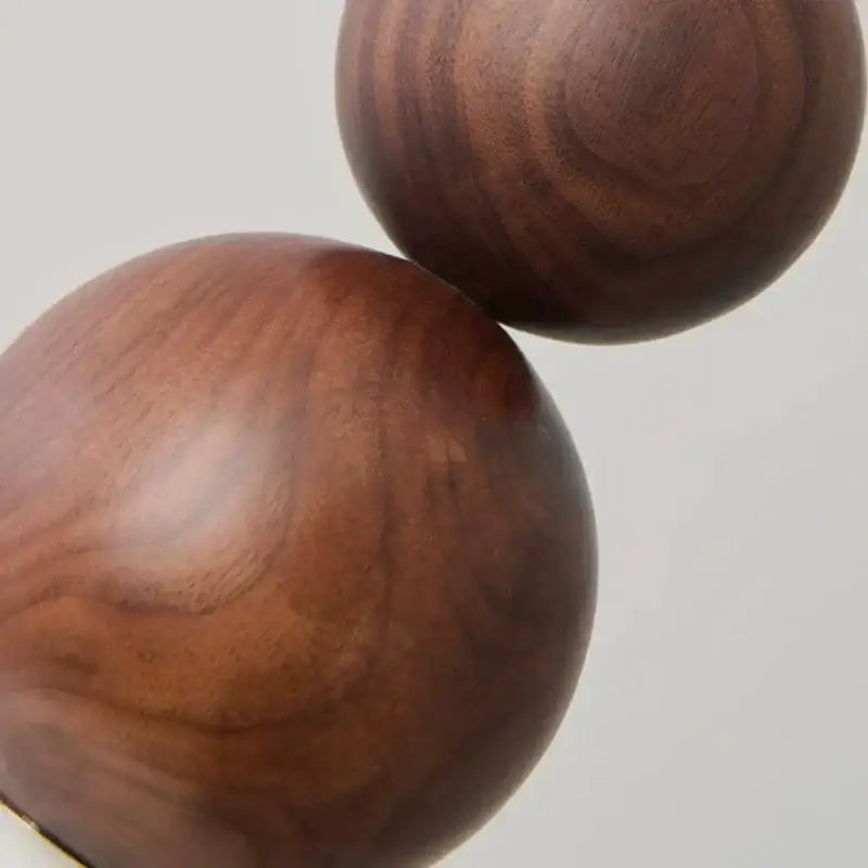 Modern walnut wood and white glass wall light with polished dark brown wooden spheres for decorbites adjustable led wall use