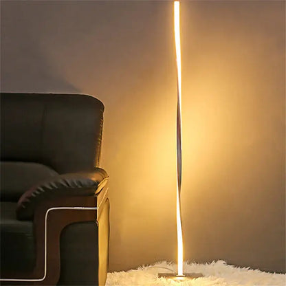 A sleek modern floor lamp with a warm white dimmable led vertical strip by decorbites for living room lighting