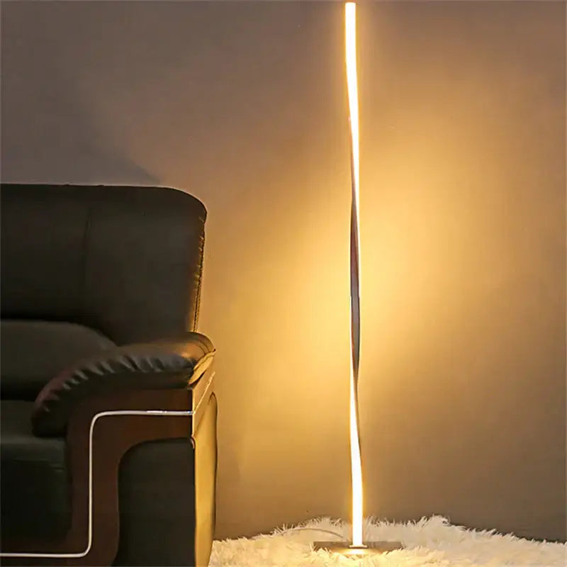 A sleek modern floor lamp with a warm white dimmable led vertical strip by decorbites for living room lighting