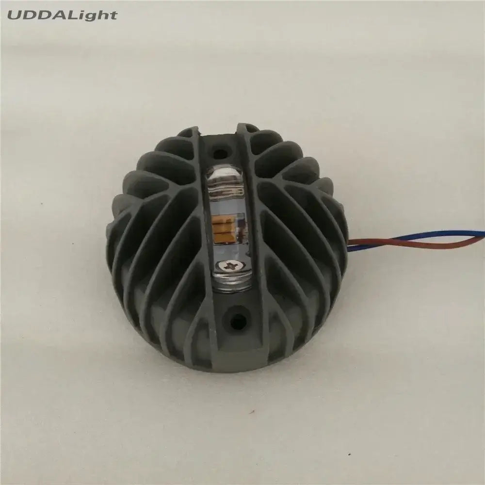 Gray ribbed aluminum heat sink with central led module and red-blue wires for modern warm white decorbites led window lighting
