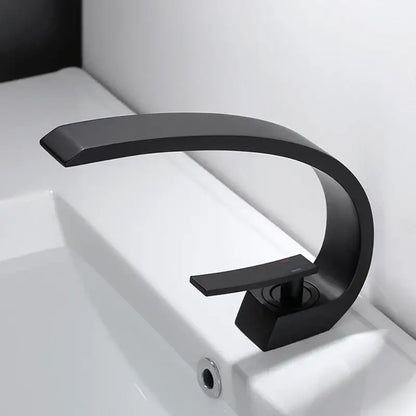 Modern black chrome basin faucet with sleek curved design and minimalist handle from decorbites black chrome collection