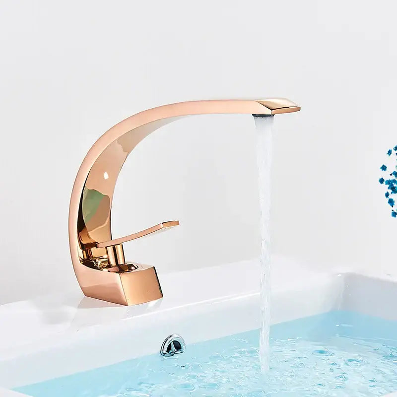 Modern waterfall black chrome basin faucet with rose gold waterfall spout and sleek curved polished metallic finish