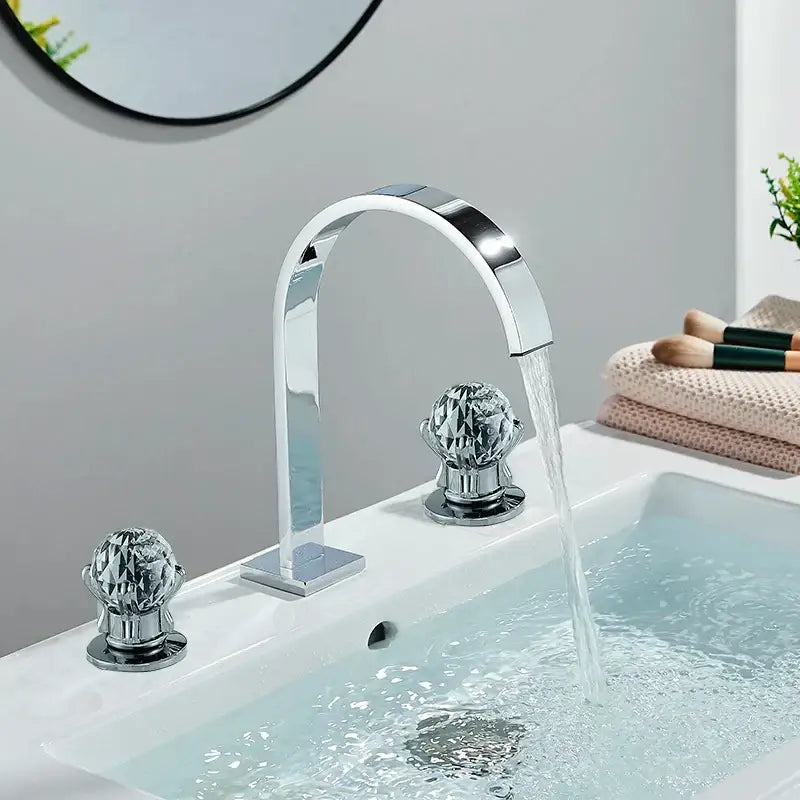Modern waterfall dual handle gold basin faucet with chrome finish and faceted crystal decorbites dual handle design