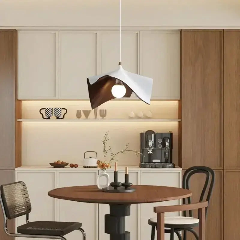 Modern wave black and bronze chandelier pendant light with sculptural folded design in white and dark wood for living room