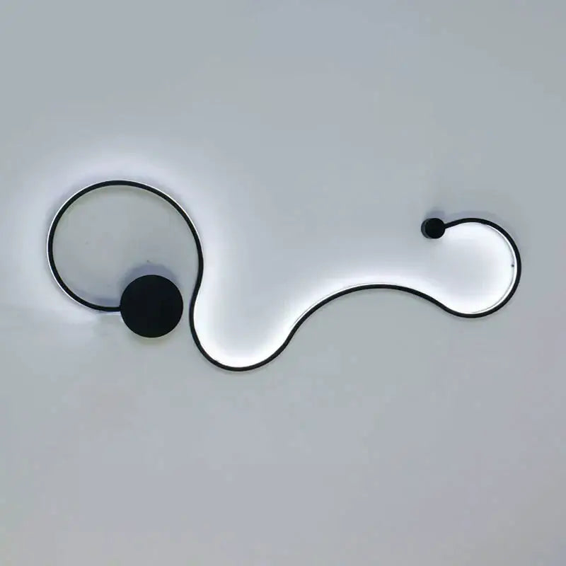 Modern wave black led wall light with sleek s-shaped design and glowing white illumination for living room decor