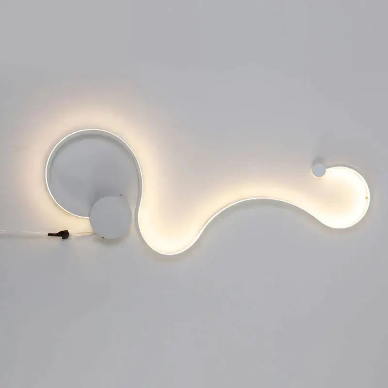 Modern white curved led wall light with sleek organic design and soft ambient glow for stylish living room decor