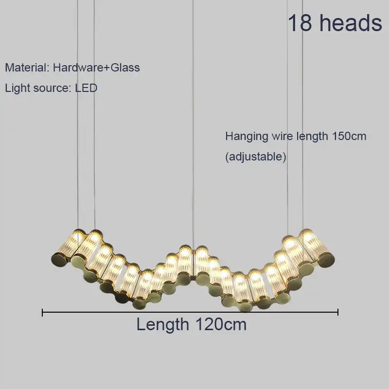 A modern wave decorbites golden chandelier with 18 golden glass and metal heads in a curved living room LED light design