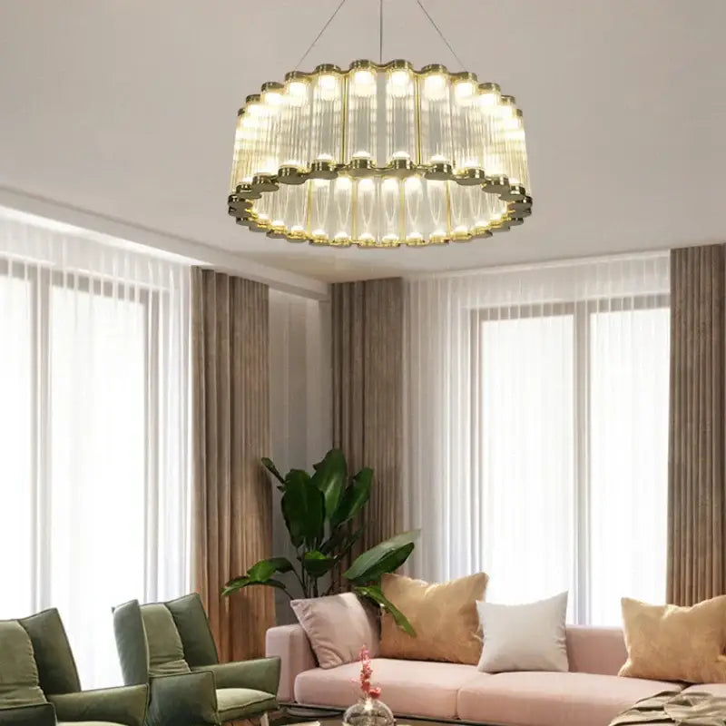 Modern wave decorbites golden chandelier with gold tone and clear vertically ribbed glass tubes in circular design