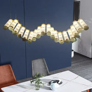 Modern wave decorbites golden chandelier with gold-toned wave design and frosted glass tubes for living room lighting
