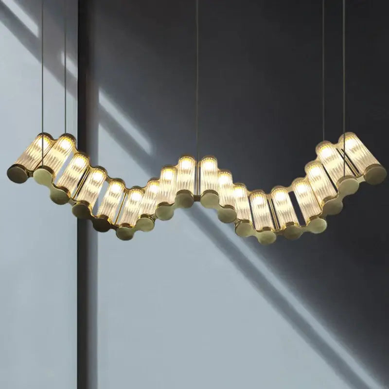Modern wave decorbites golden chandelier with gold-toned glass tubes and metallic accents for living room LED light