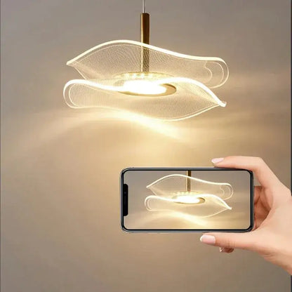Modern wave glass gold led pendant light with translucent wave design and warm illumination for dining tables and living rooms