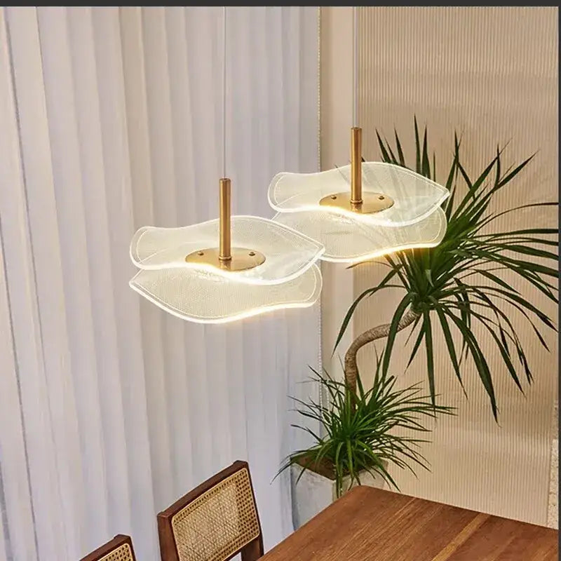 Modern wave glass gold led pendant with two frosted petal-shaped shades on gold rods for dining tables and living rooms