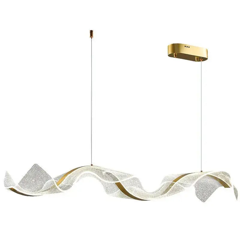 A modern wave gold acrylic led pendant lamp with a translucent glittering diffuser and polished brass mount for dining room