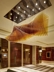 Modern wave golden designer chandelier with geometric design suspended ceiling ideal for dining room decorbites designer chandelier