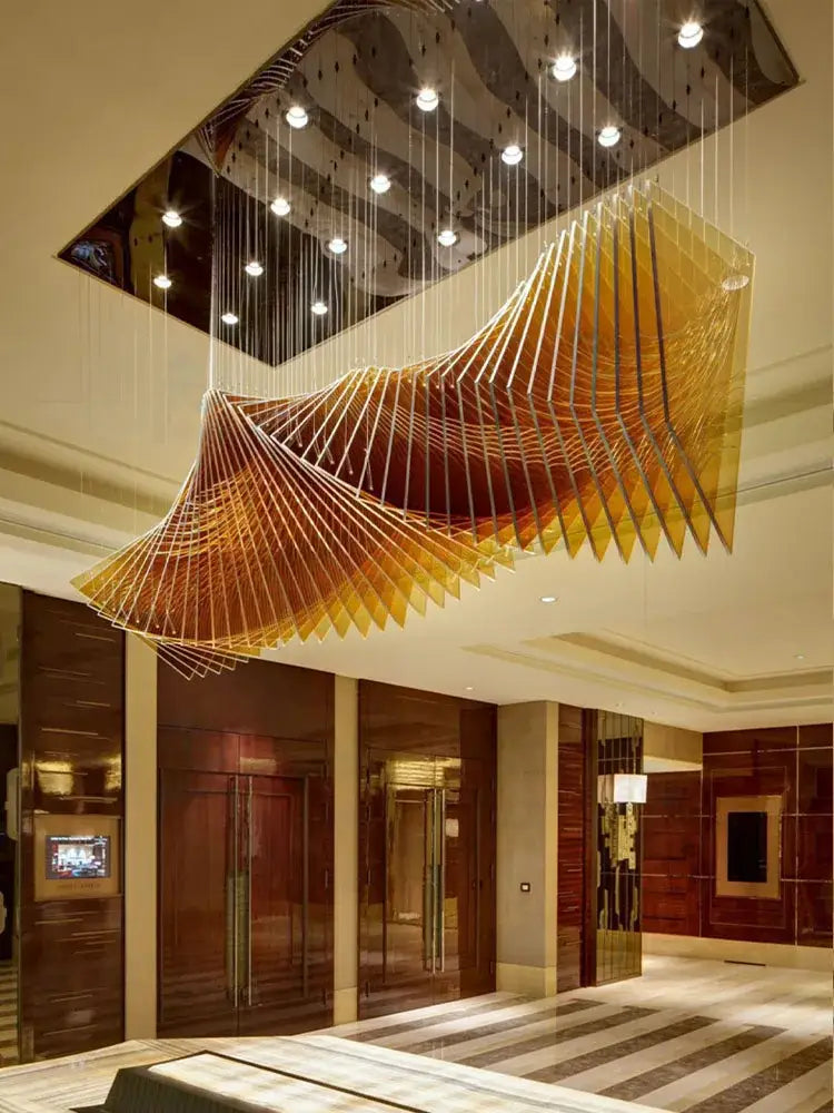 Modern wave golden designer chandelier with geometric design suspended ceiling ideal for dining room decorbites designer chandelier