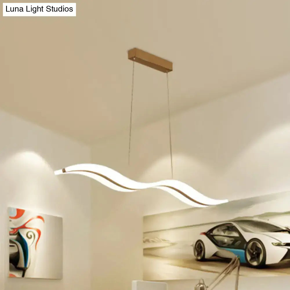 Decorbites sleek acrylic led pendant light fixture with wavy design and warm white illumination for dining ambiance