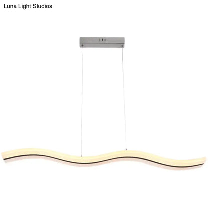 DecorBites sleek acrylic led pendant light fixture with curved wooden body and brushed metal mount for chic dining ambiance