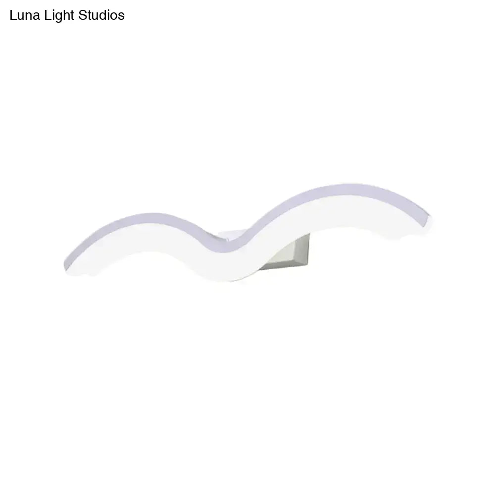 Modern wavelet black and white wall sconce with sleek wave shape and soft lavender LED glow for bathroom lighting