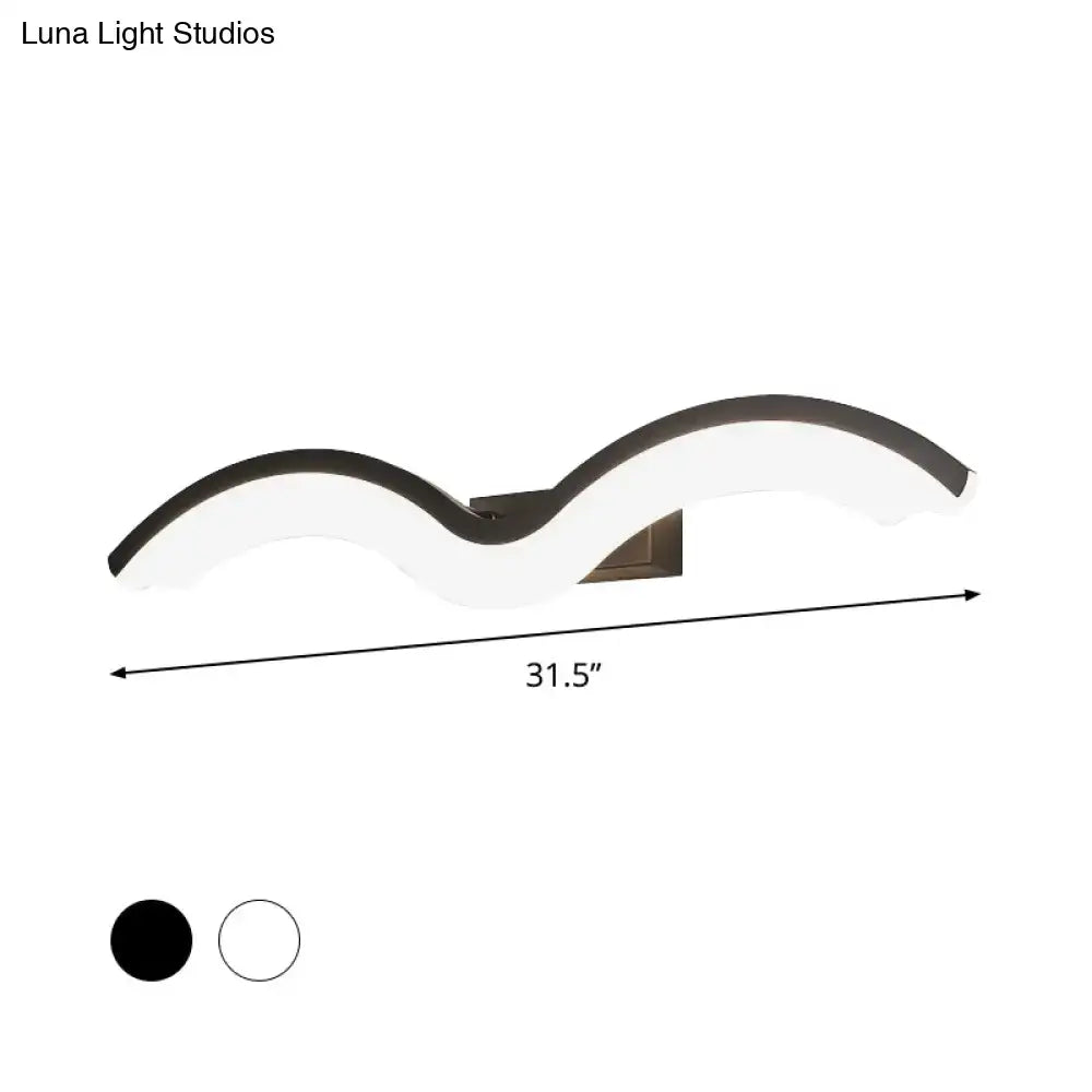 Modern wavelet black and white wall sconce with sleek illuminated body and matte bronze bracket for bathroom led lighting