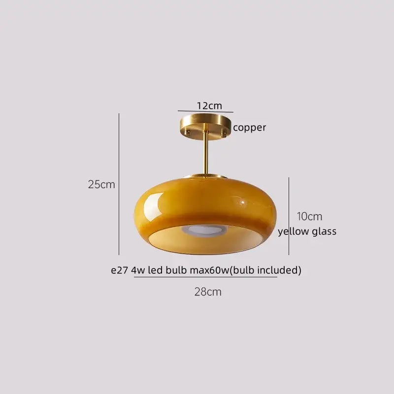 A sleek modern ceiling lamp with yellow glass shade and polished copper finish for decorbites led wood acrylic decor