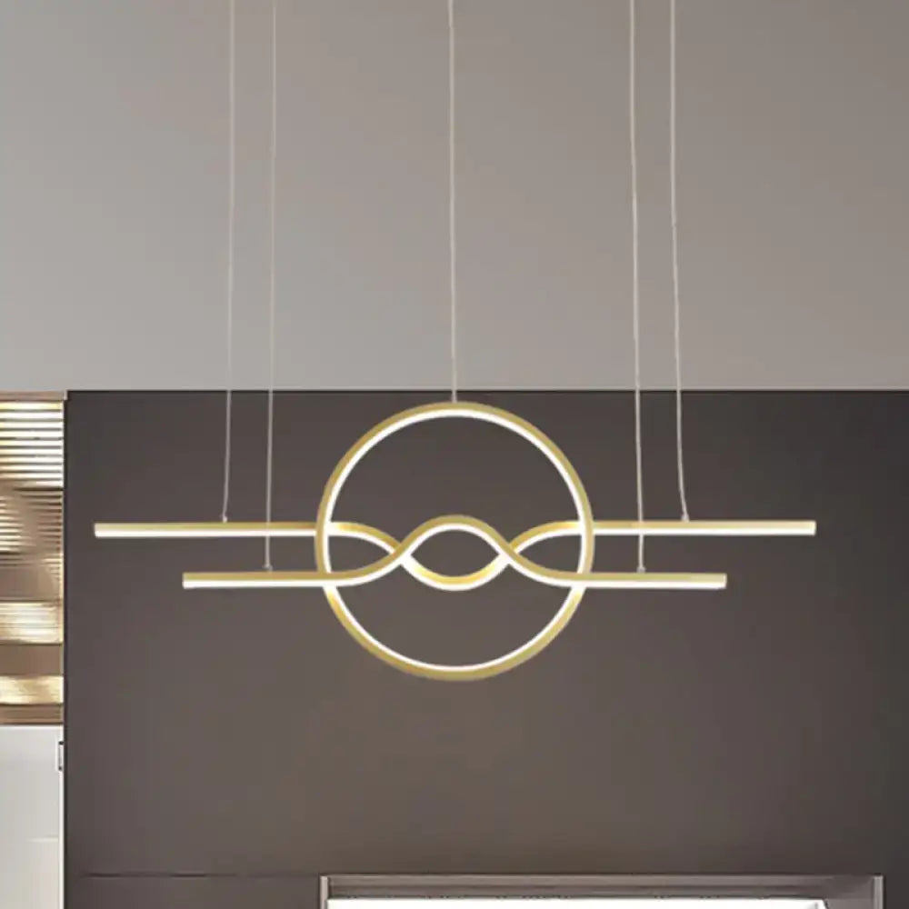 Decorbites gold island LED pendant light in a warm white gold-toned geometric design for dining area lighting