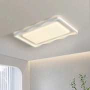 Modern wavy white cream style led ceiling lamp with sleek rectangular design and soft diffused illumination for living room decorbites cream style