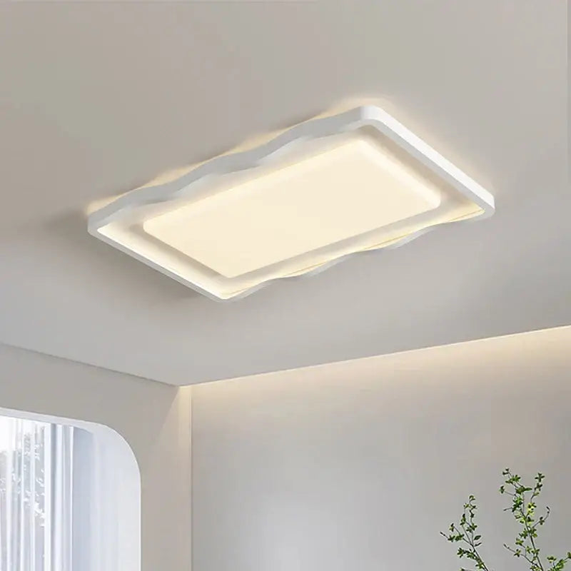 Modern wavy white cream style led ceiling lamp with sleek rectangular design and soft diffused illumination for living room decorbites cream style