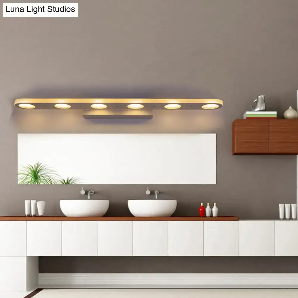 Modern white vanity wall light with five warm white led bulbs in a sleek rectangular fixture for bathroom use