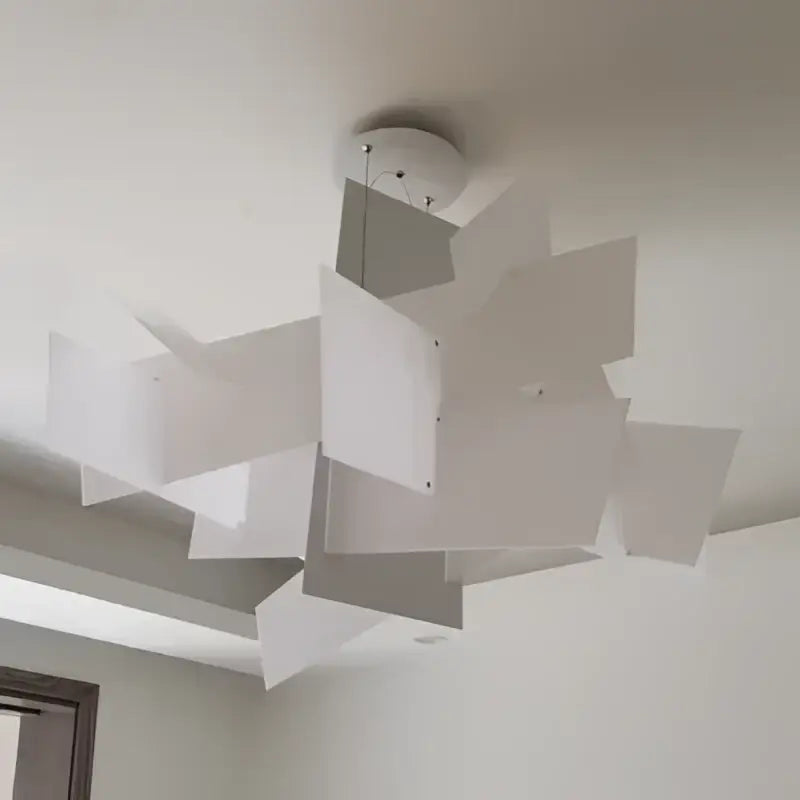 Modern white abstract led pendant lamp with angular layered panels for living room decorbites big bang led lighting