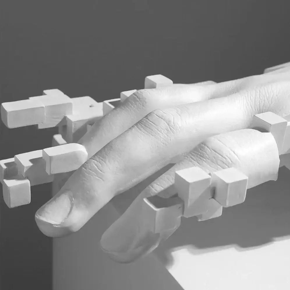 Modern white abstract resin mosaic sculpture of a hand with geometric cube-like decorbites abstract resin attachments