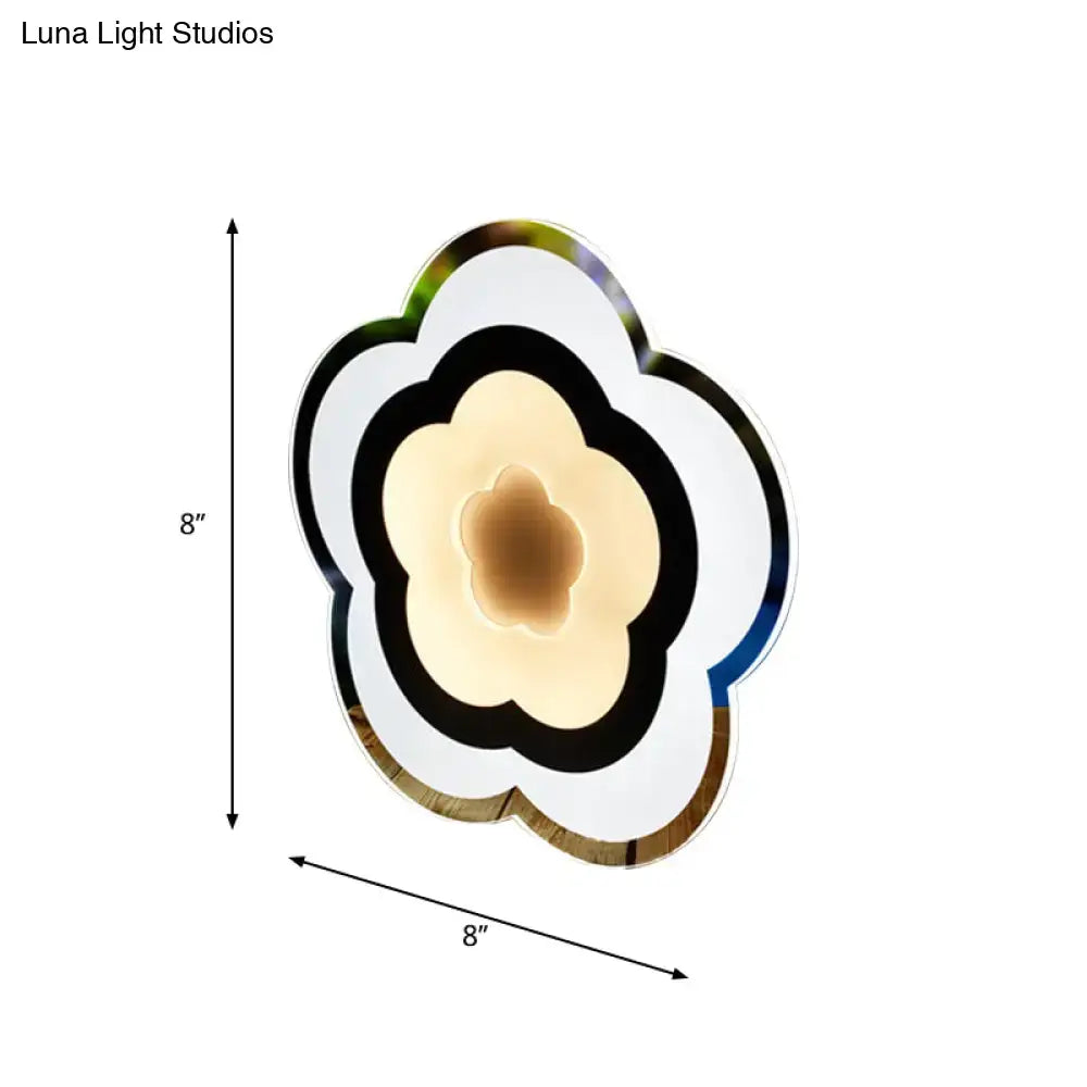 Modern white acrylic cloud wall lamp with concentric rings and warm ambient lighting for bedroom use