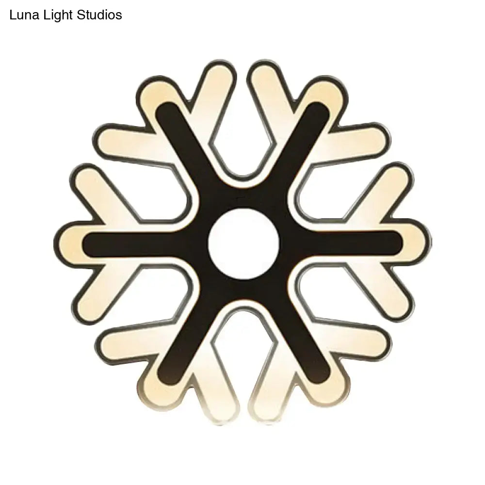 Modern snowflake-shaped led ceiling light with sleek black and cream design complementing white acrylic wall lamp style