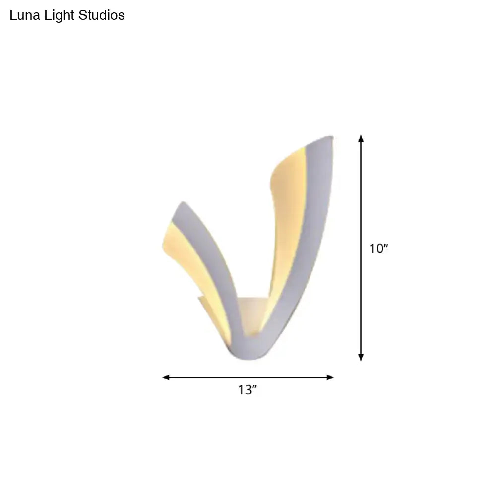 Modern v-shaped wall lamp with sleek gray and warm gold accents paired with white acrylic cloud led table lamp