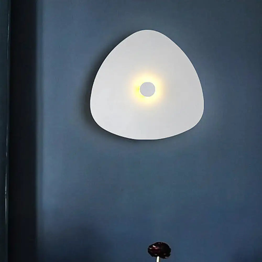 Modern white acrylic flaky sconce light with triangular design and warm central illumination for bedroom wall fixture