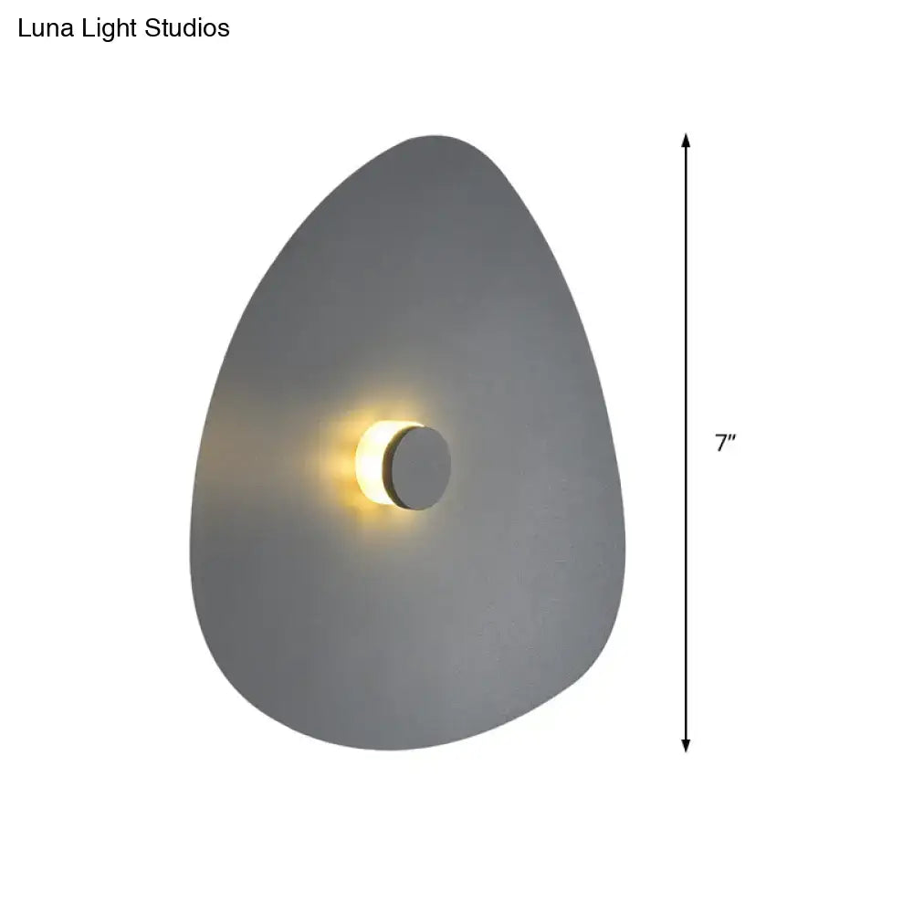 Modern gray teardrop-shaped flaky sconce light with warm circular light for bedroom wall fixture in white acrylic