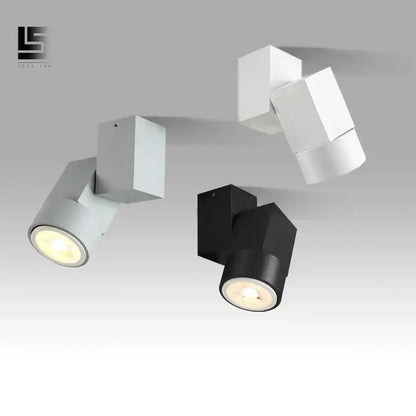 Modern white adjustable angle downlight with sleek black geometric cube fixtures for living room spotlighting