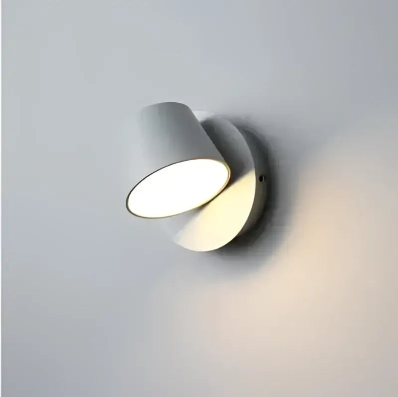 Modern white adjustable led wall lamp with sleek cylindrical design and smooth metallic finish for living room use