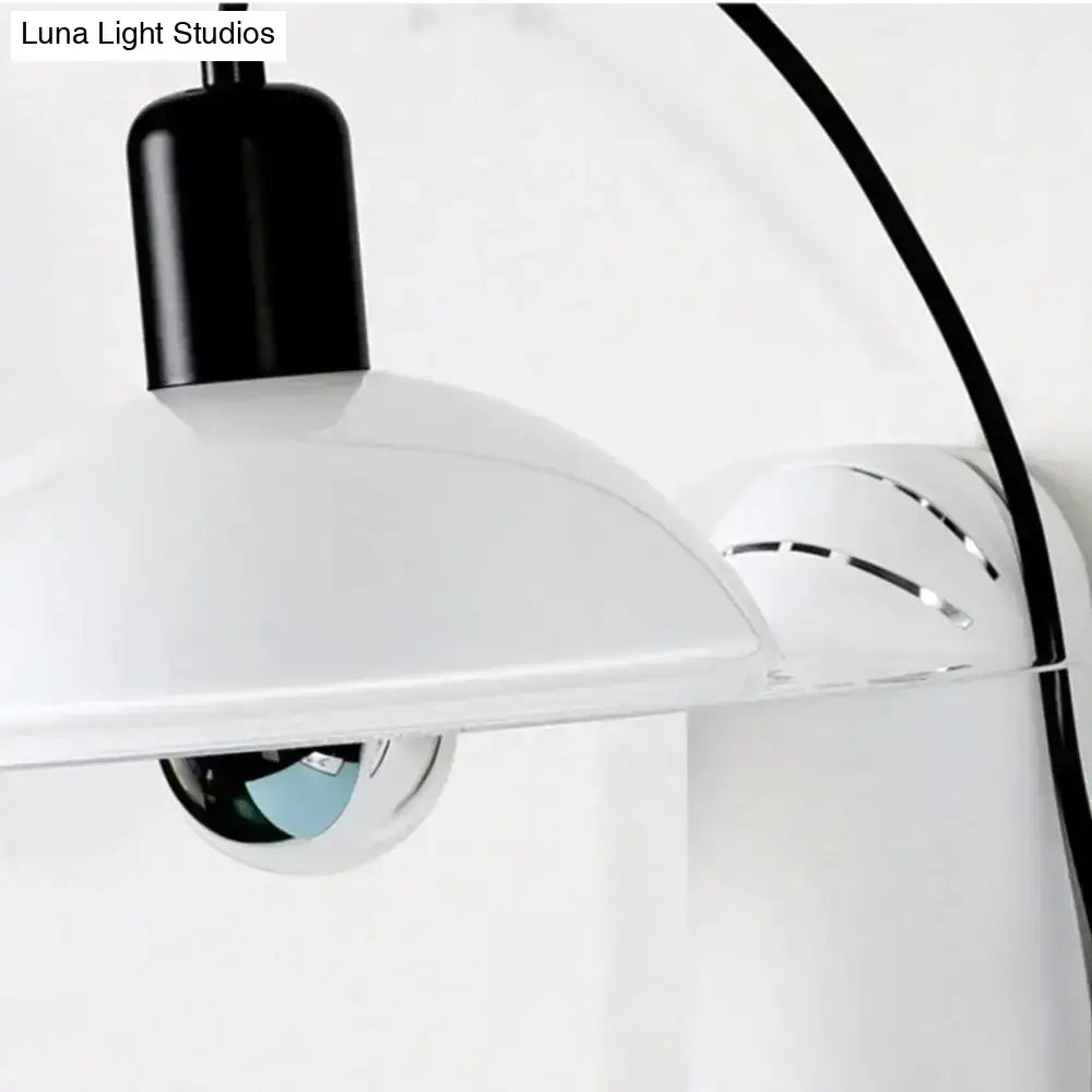 Modern white adjustable wall sconce with a dome-shaped pendant light and chrome spherical bulb housing for reading