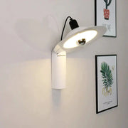Modern white wall sconce reading lamp with sleek adjustable head for bedroom wall mounting and focused lighting