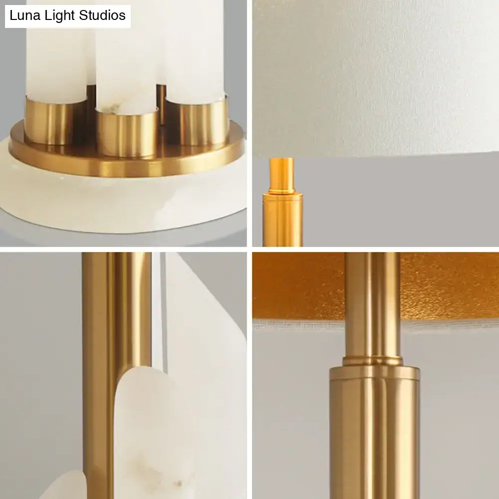 Modern table lamp with three frosted white cylindrical shades on brushed gold metal base for drum table lighting 220v-240v