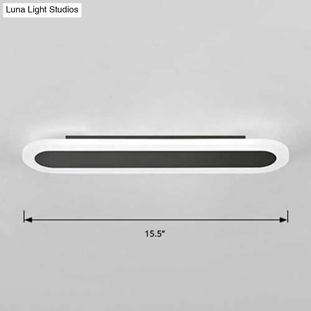 Modern white and black acrylic bar wall lamp with sleek oval housing and black panel for 110v-120v 220v-240v use