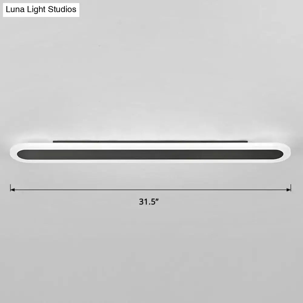 Modern white and black acrylic bar wall lamp with sleek oval housing and black panel measuring 31.5 inches 110v-240v