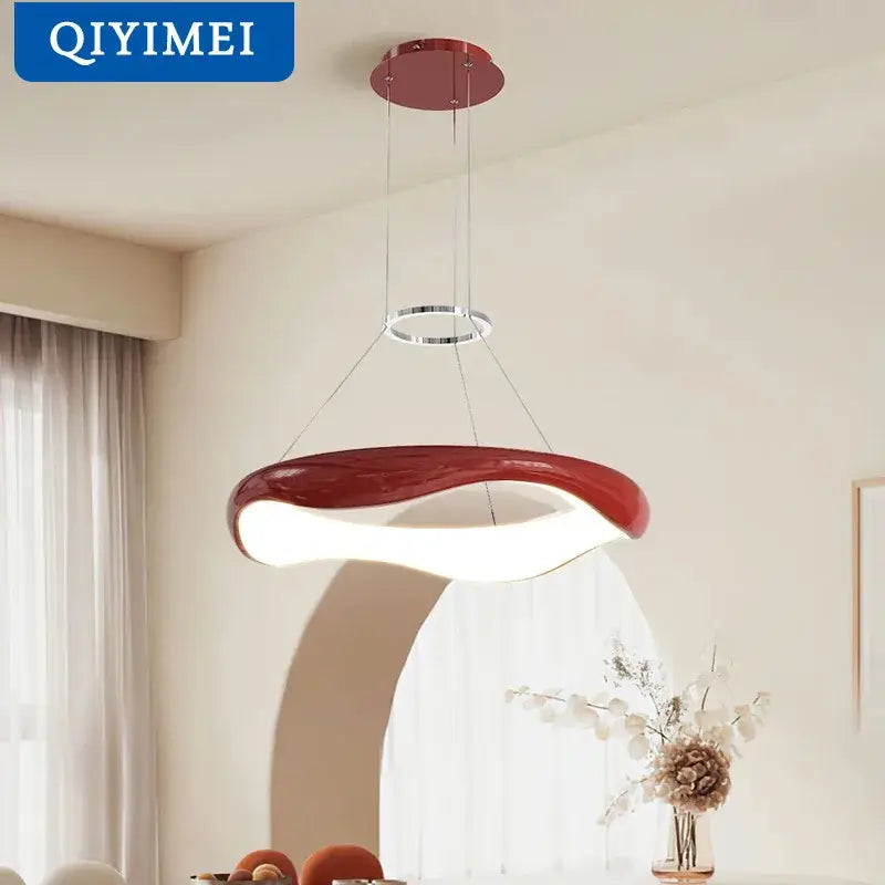 Modern white and black chrome pendant lamp with red and white curved design suspended by chains for dining room decorbites black chrome