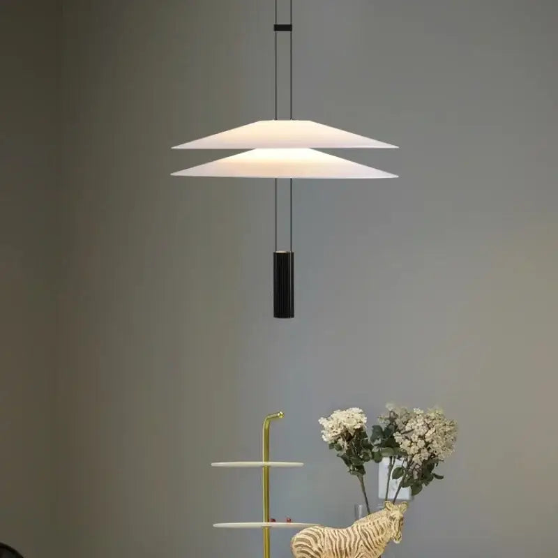Modern white and black circular pendant light with layered design and sleek black base for dining room decorbites circular pendant
